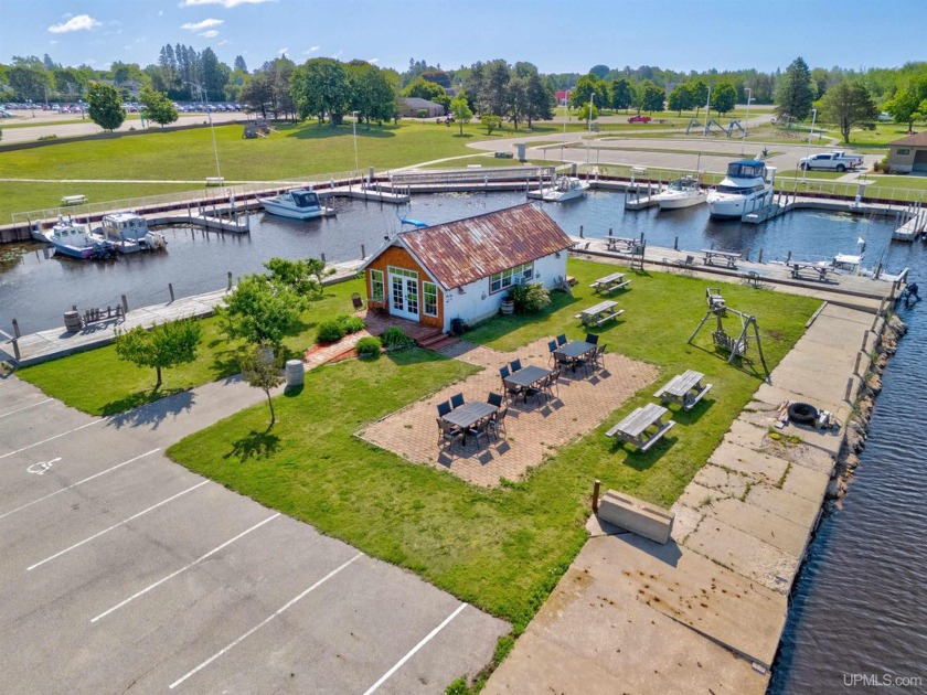 Blending location, lifestyle, and lakefront appeal, this unique - Beach Commercial for sale in Manistique, Michigan on Beachhouse.com