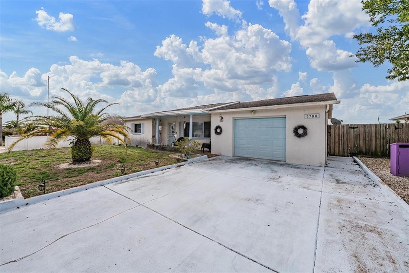 Welcome to this charming 2-bedroom, 2-bathroom home with a 1-car - Beach Home for sale in New Port Richey, Florida on Beachhouse.com