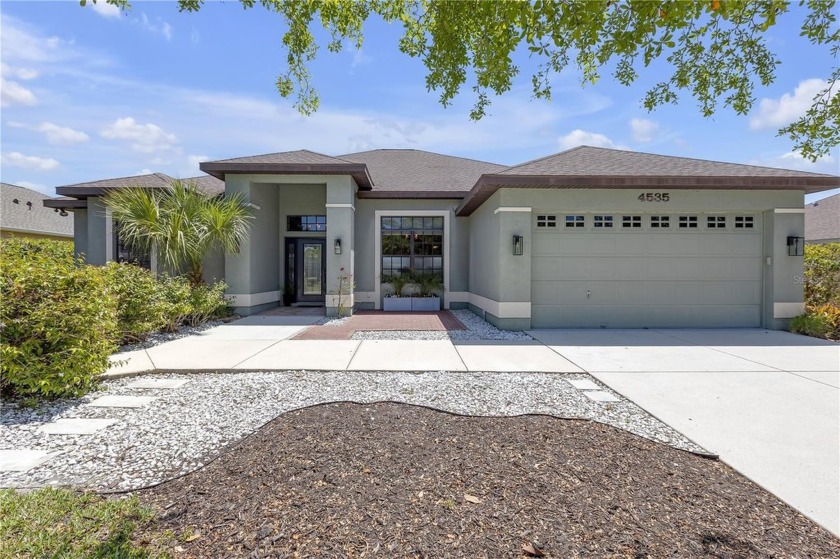 Nestled in the serene Sugar Mill Lakes community, 4535 29th - Beach Home for sale in Palmetto, Florida on Beachhouse.com