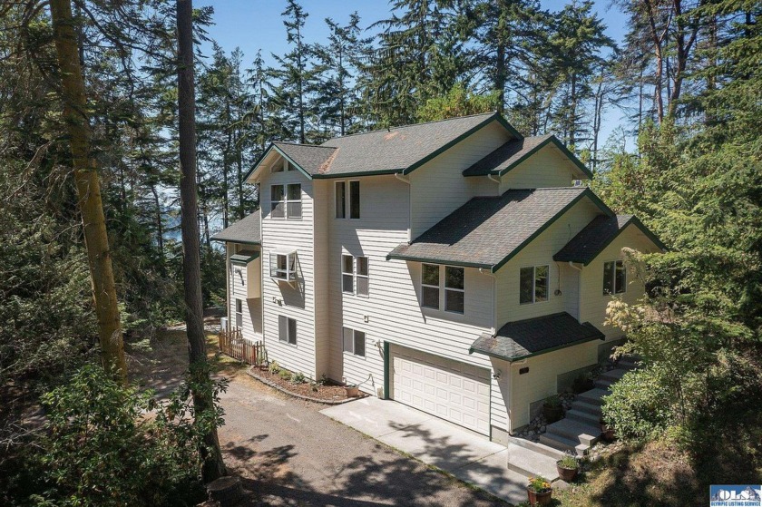 This spacious bluff-top retreat rests on 12 forested acres with - Beach Home for sale in Port Angeles, Washington on Beachhouse.com