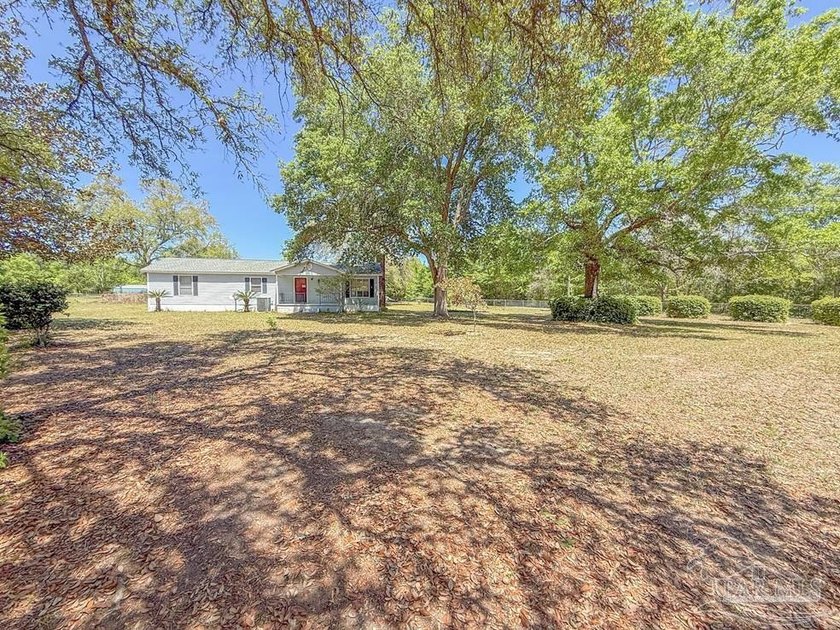 Private 3.73-acre country retreat with endless potential just 5 - Beach Home for sale in Milton, Florida on Beachhouse.com