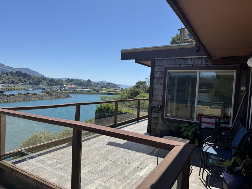 Indulge in waterfront living at its finest with this charming - Beach Condo for sale in Brookings, Oregon on Beachhouse.com
