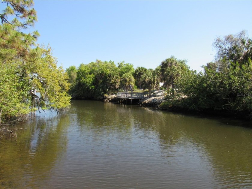 PRICE IMPROVEMENT! This waterfront duplex, with gulf access, has - Beach Home for sale in Port Charlotte, Florida on Beachhouse.com