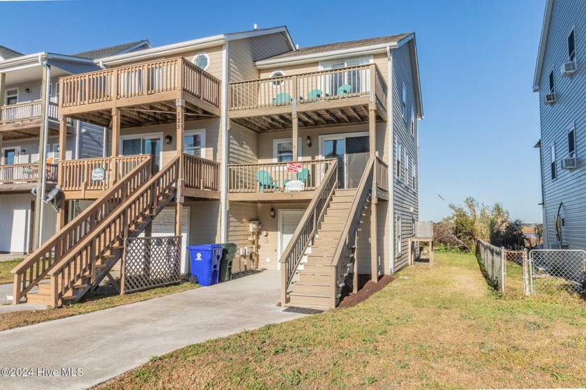 This charming two-story, two-bedroom, two-bathroom townhome is - Beach Home for sale in North Topsail Beach, North Carolina on Beachhouse.com