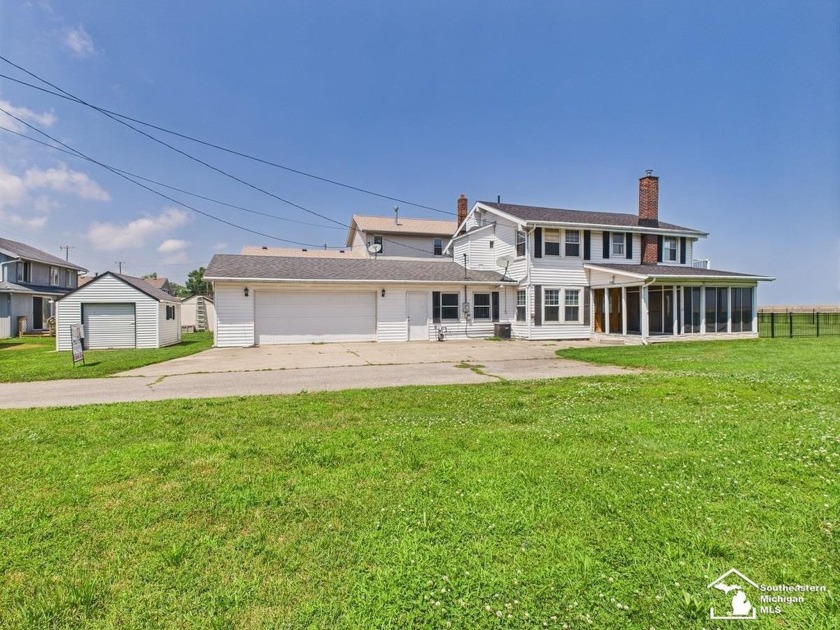 Wake up to breathtaking Lake Erie views every day in this - Beach Home for sale in Luna Pier, Michigan on Beachhouse.com