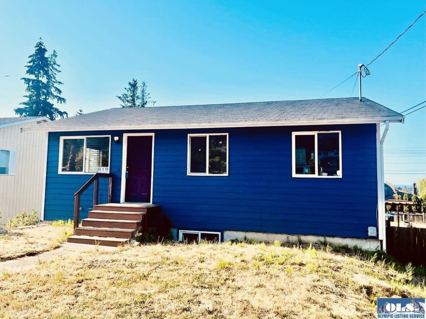 This charming partial water view home is situated on a quiet - Beach Home for sale in Port Angeles, Washington on Beachhouse.com