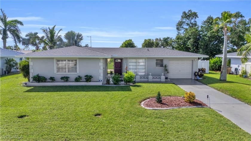 This charming three-bedroom, two-bathroom home features direct - Beach Home for sale in Cape Coral, Florida on Beachhouse.com