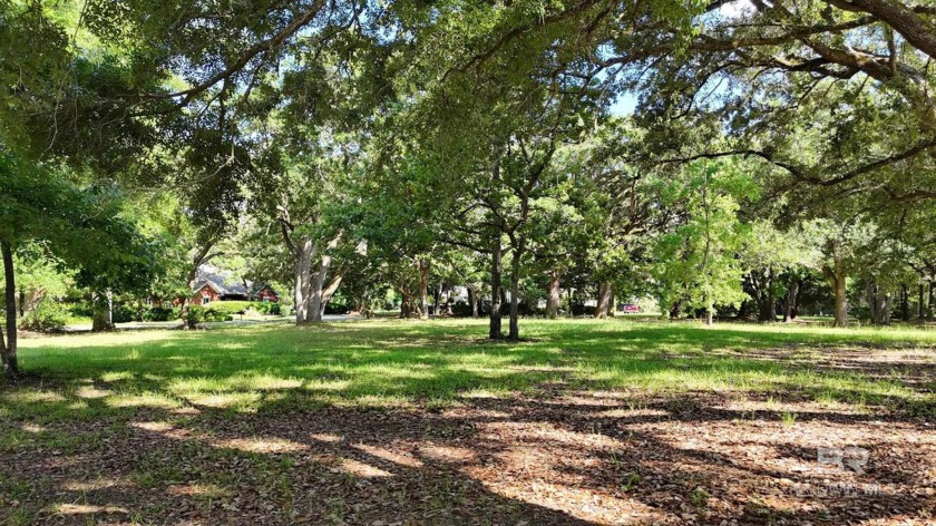 Discover your ideal homesite in Heritage Woods, a serene Gulf - Beach Lot for sale in Gulf Shores, Alabama on Beachhouse.com