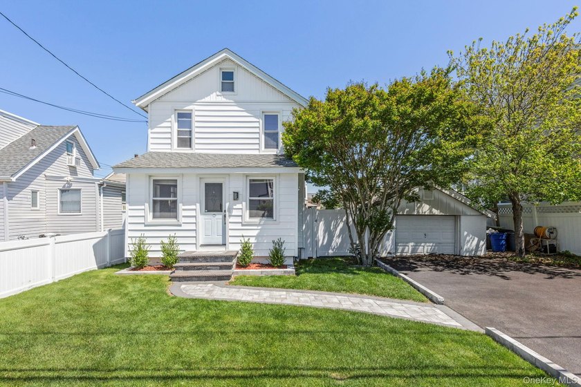 Welcome To 102 Clubhouse Road - A Charming Waterfront Home - Beach Home for sale in Bellmore, New York on Beachhouse.com