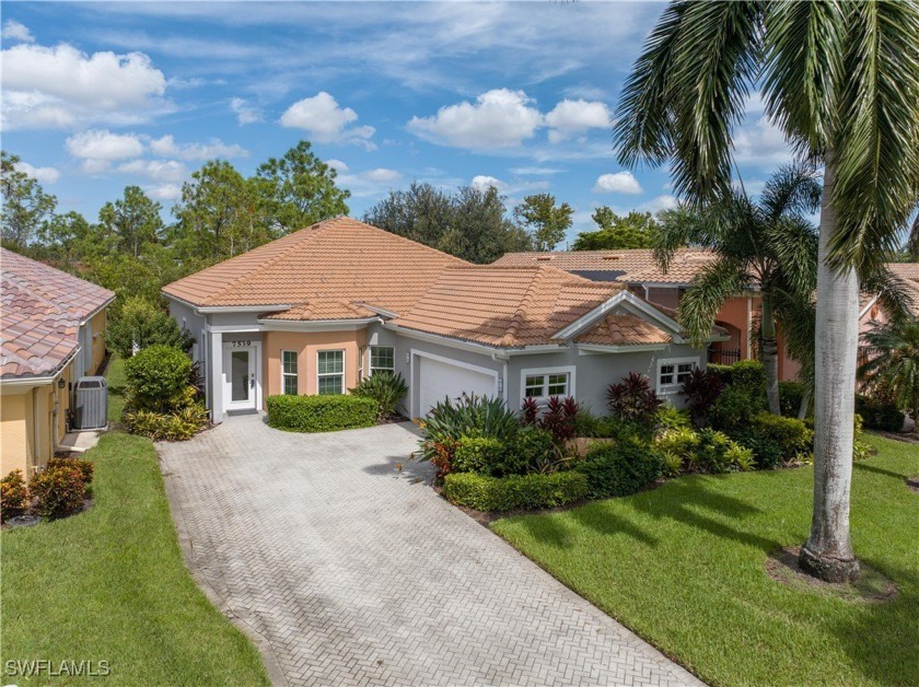 This remarkable residence offers three bedrooms and two - Beach Home for sale in Fort Myers, Florida on Beachhouse.com