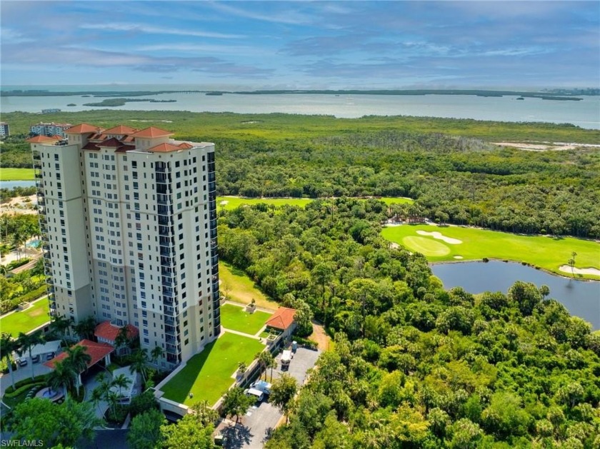 In a lush, tropical oasis, this second-floor resort-style - Beach Home for sale in Bonita Springs, Florida on Beachhouse.com