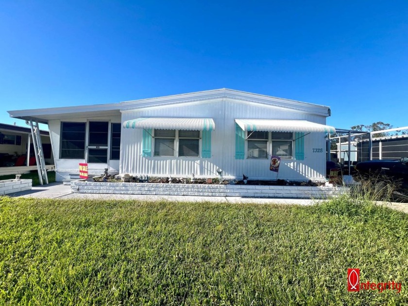 This charming two-bedroom, two-bathroom mobile home is located - Beach Home for sale in Ellenton, Florida on Beachhouse.com