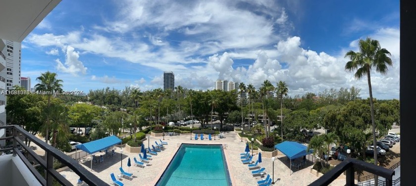 The view of the pool makes sense of living in a resort style - Beach Condo for sale in Hallandale Beach, Florida on Beachhouse.com