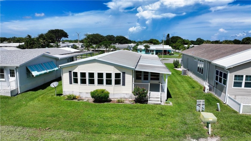 2 bed/2 bath, 1,384 sq ft of living space overlooking the Golf - Beach Home for sale in Barefoot Bay, Florida on Beachhouse.com