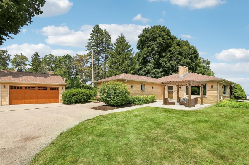 RARE OPPORTUNITY ON LAKE MICHIGAN! Rebuilt and extensively - Beach Home for sale in Racine, Wisconsin on Beachhouse.com