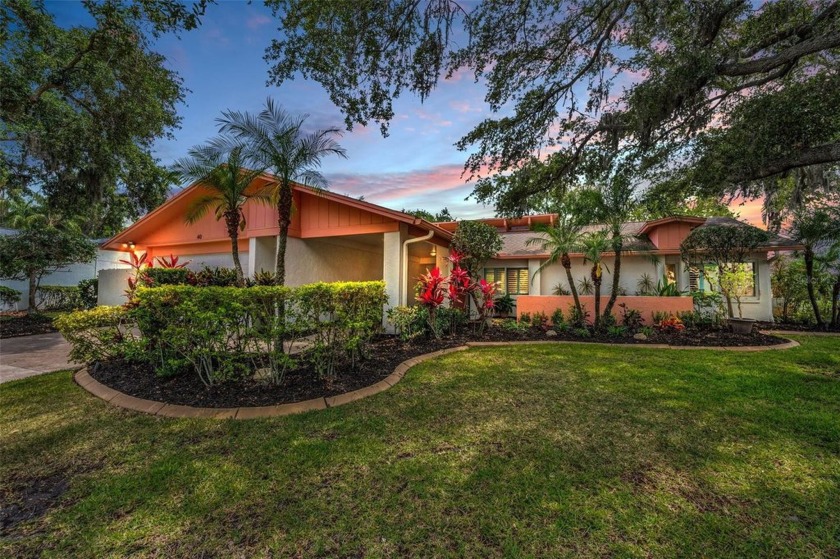 Located in a unique enclave on the South Golf Course of East - Beach Home for sale in Oldsmar, Florida on Beachhouse.com