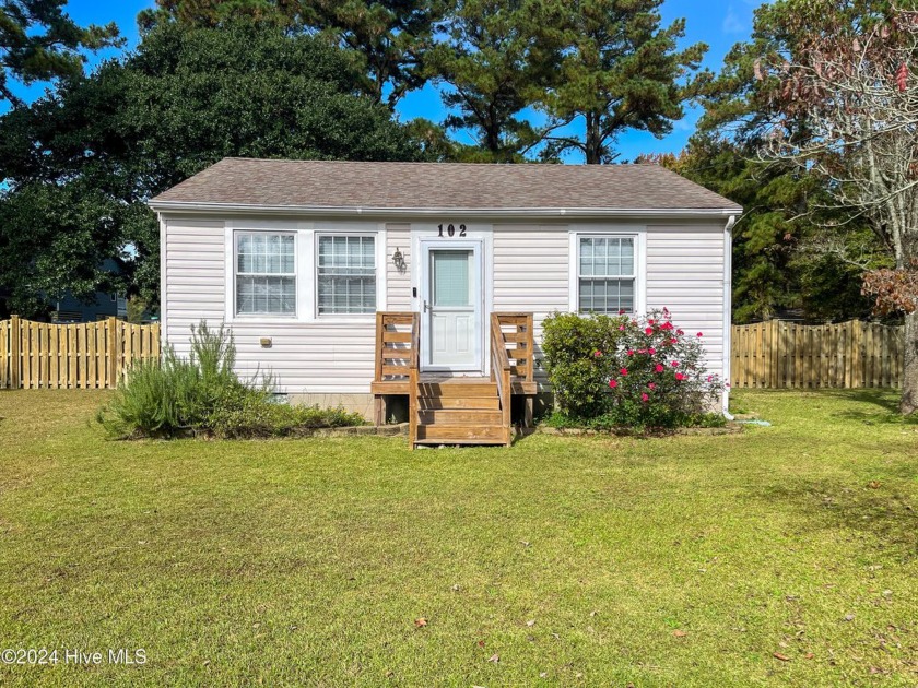 This home is the epitome of quaint, southern living! Nestled on - Beach Home for sale in Jarvisburg, North Carolina on Beachhouse.com