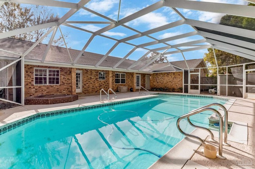 This ranch style home sits on a beautiful lot with timeless curb - Beach Home for sale in Pensacola, Florida on Beachhouse.com