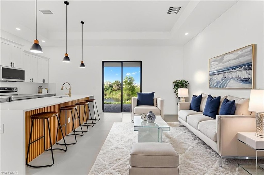 BRAND NEW WATERFRONT HOME - PRICED TO SELL - WITH DESIGNER - Beach Home for sale in Cape Coral, Florida on Beachhouse.com