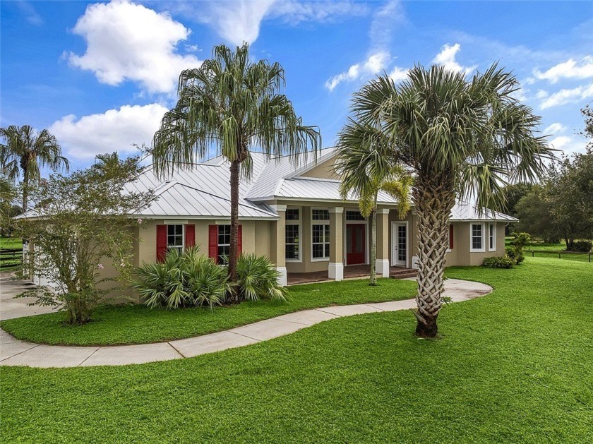 Nestled on over 10 serene acres, this custom-built gem boasts - Beach Home for sale in Vero Beach, Florida on Beachhouse.com