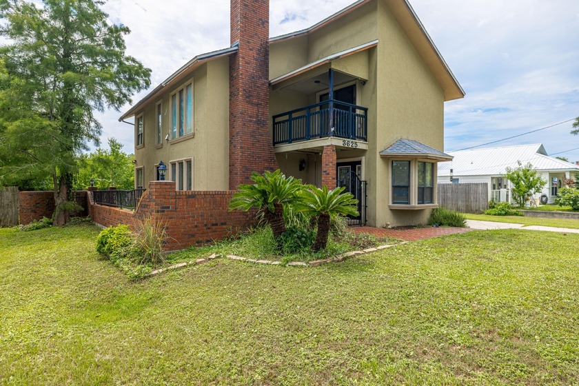 Nestled on a spacious 0.25-acre lot on the desirable east end of - Beach Home for sale in Panama City, Florida on Beachhouse.com