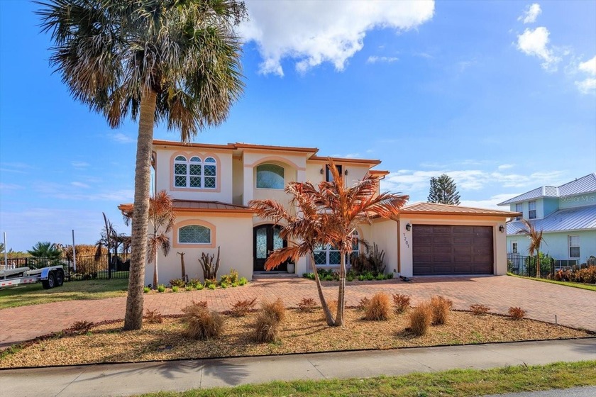 Stunning custom 2020 riverfront home offering direct access to - Beach Home for sale in Edgewater, Florida on Beachhouse.com