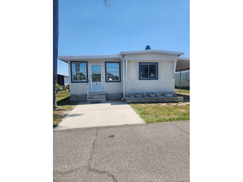 This well-kept home features two bedrooms, 1 1/2 baths, new - Beach Home for sale in Ruskin, Florida on Beachhouse.com