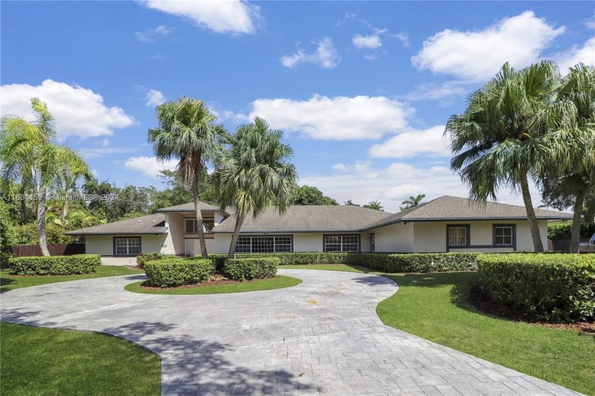 Welcome home to this sprawling pool home showcases exceptional - Beach Home for sale in Palmetto Bay, Florida on Beachhouse.com