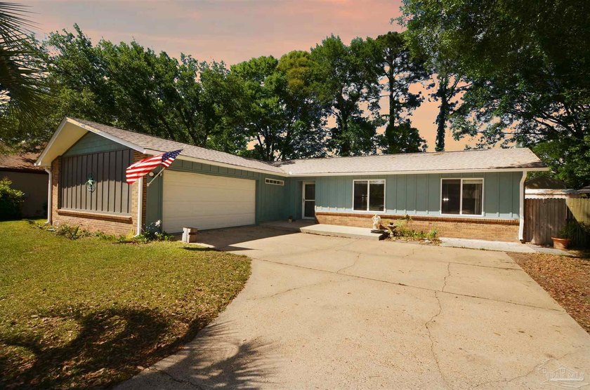 Nestled in a peaceful cul-de-sac in beautiful Pensacola, this - Beach Home for sale in Pensacola, Florida on Beachhouse.com