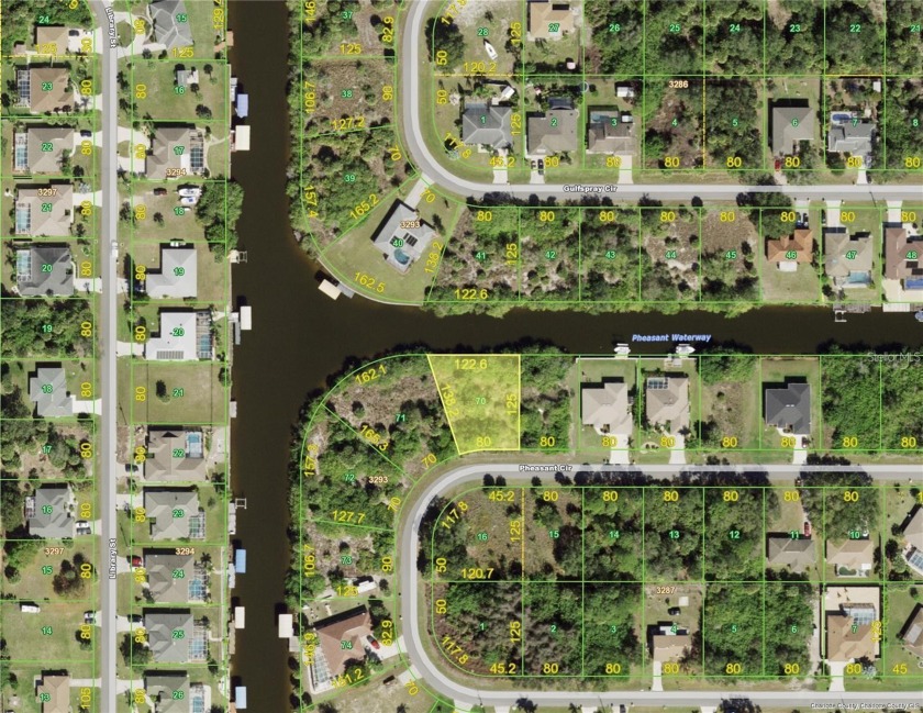 PORT CHARLOTTE - LOVELY WATERFRONT LOT FOR YOUR NEW HOME.  YOU - Beach Lot for sale in Port Charlotte, Florida on Beachhouse.com