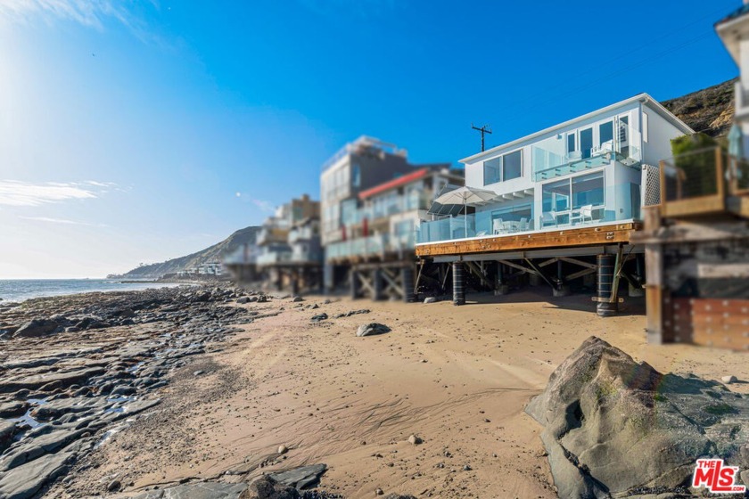Perched above the sandy expanse of Las Tunas Beach in a highly - Beach Home for sale in Malibu, California on Beachhouse.com