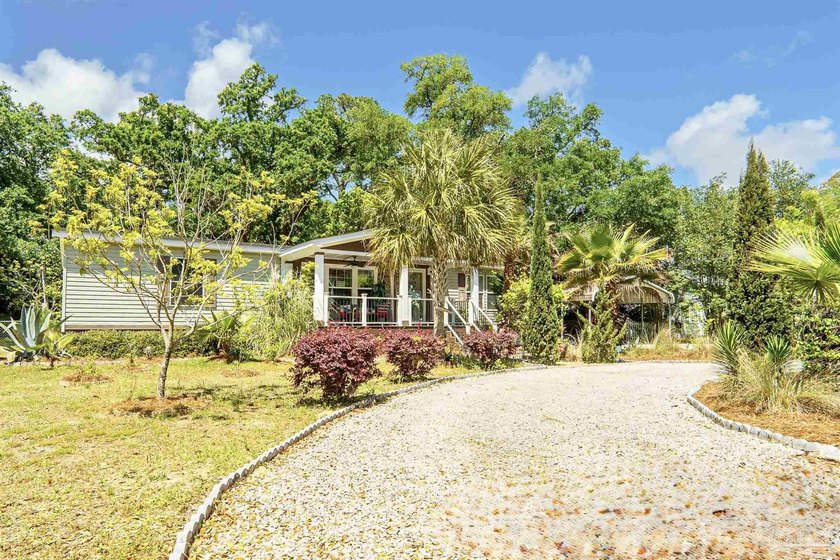 This beautifully maintained 2015 manufactured home offers a - Beach Home for sale in Pensacola, Florida on Beachhouse.com