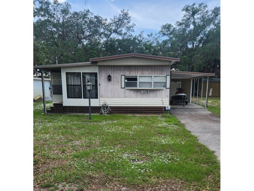 This 2-bedroom one bath home has water access from your backyard - Beach Home for sale in Ruskin, Florida on Beachhouse.com