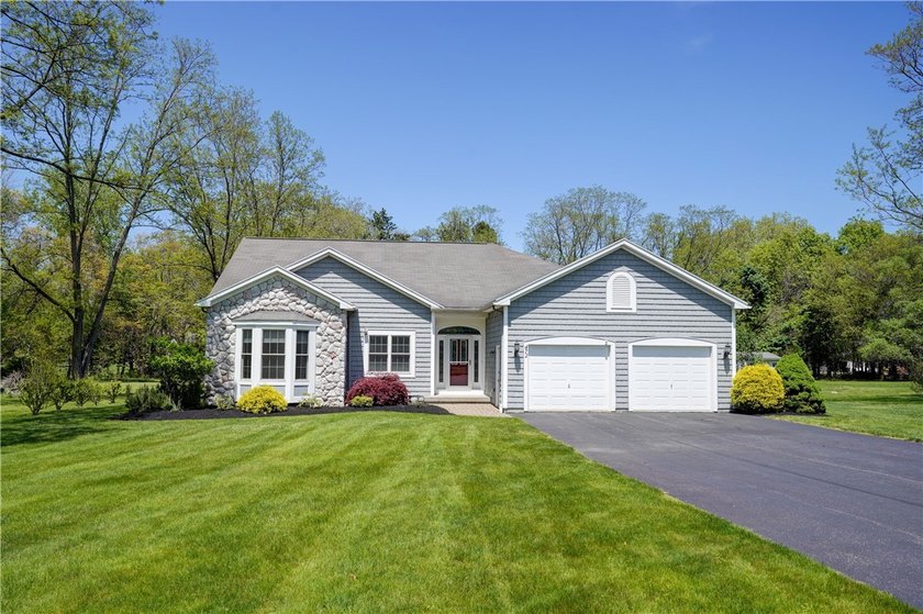 Welcome to this serene and private setting on 1.23 acres backing - Beach Home for sale in Webster, New York on Beachhouse.com