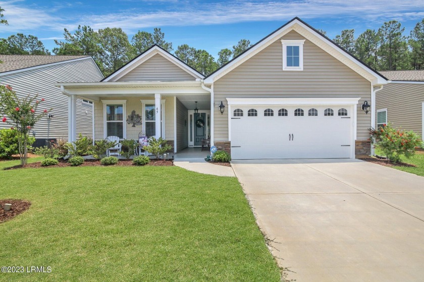 The Killarney Ranch Model has a cozy porch welcoming guests to - Beach Home for sale in Bluffton, South Carolina on Beachhouse.com