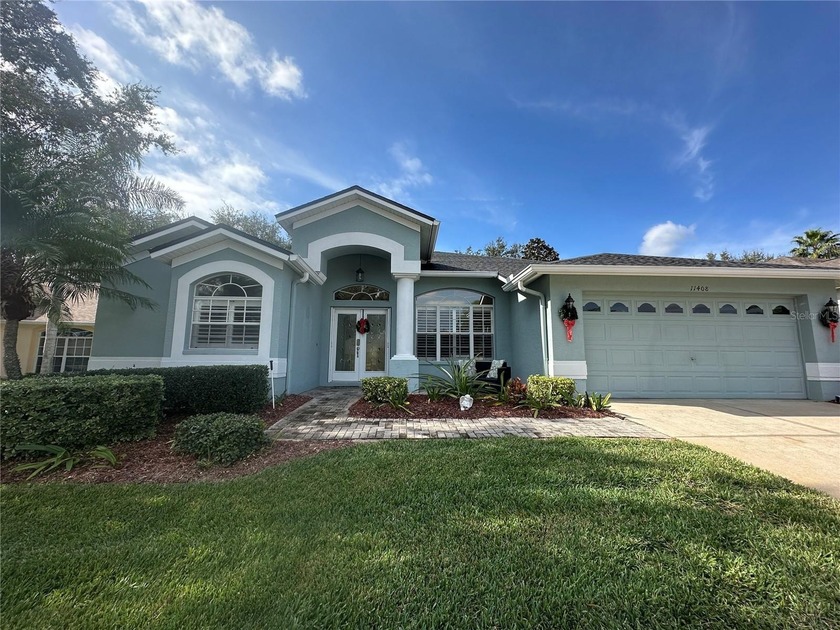 Welcome to this beautifully maintained home offering bright - Beach Home for sale in Hudson, Florida on Beachhouse.com