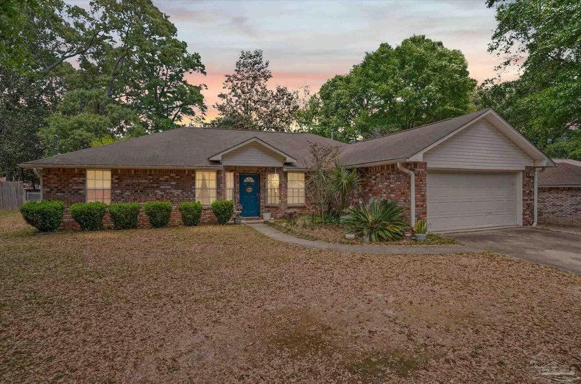 Welcome home to this well-maintained brick residence offering - Beach Home for sale in Pensacola, Florida on Beachhouse.com