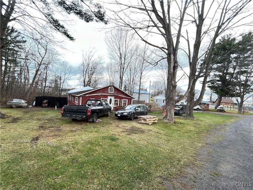 An incredible opportunity awaits! Whether you're dreaming of - Beach Home for sale in Sandy Creek, New York on Beachhouse.com