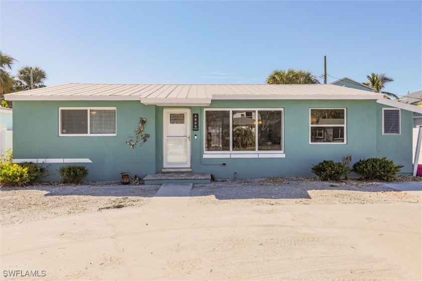 This beach house offers incredible potential with a pool and - Beach Home for sale in Fort Myers Beach, Florida on Beachhouse.com