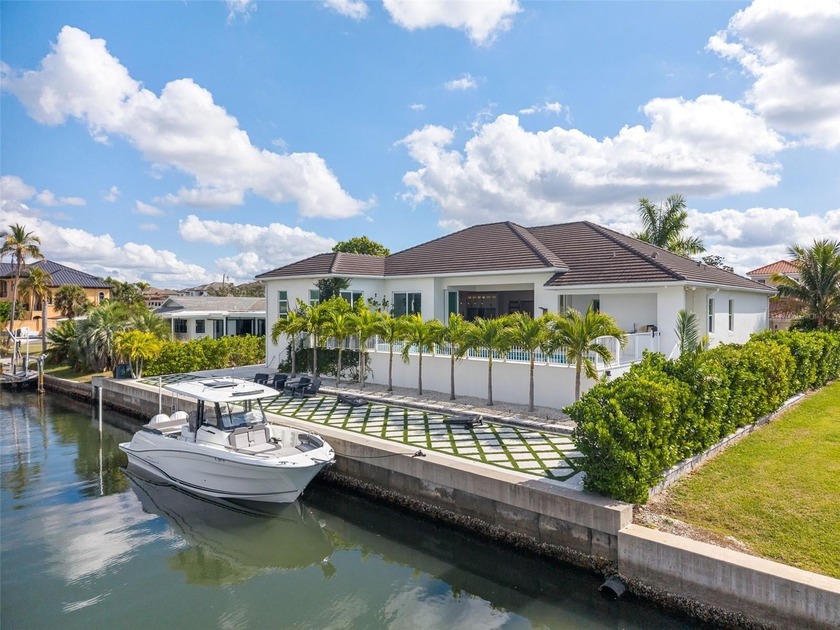 Perfectly positioned along the water, this exceptional residence - Beach Home for sale in Sarasota, Florida on Beachhouse.com