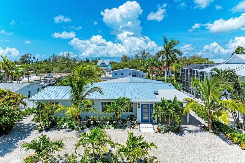 An exceptional waterfront offering on Anna Maria Island, this - Beach Home for sale in Holmes Beach, Florida on Beachhouse.com