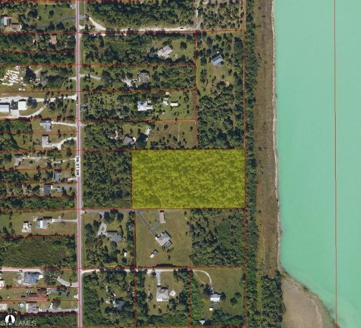 100% UPLAND! Discover this prime 4.80-acre homesite in the - Beach Acreage for sale in Naples, Florida on Beachhouse.com