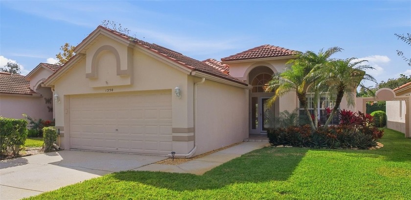 Stunning Stratford Model Villa on the Golf Course with Pool - - Beach Home for sale in Tarpon Springs, Florida on Beachhouse.com