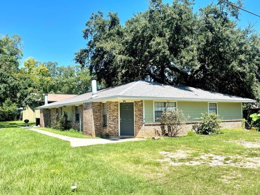 LOCATION says it all!  2 Duplex's 4 units on almost .50 of an - Beach Home for sale in Long Beach, Mississippi on Beachhouse.com