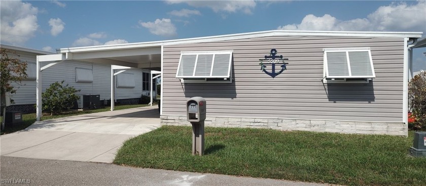 This beautiful home sits on a gulf access canal with its own - Beach Home for sale in North Fort Myers, Florida on Beachhouse.com