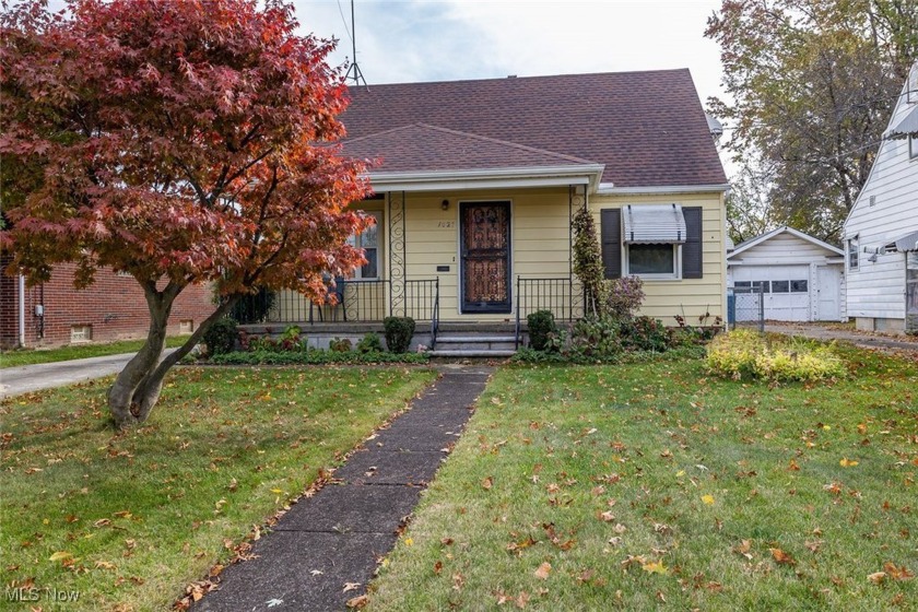 This charming 3-bedroom Cape Cod located on a lovely street in - Beach Home for sale in Lorain, Ohio on Beachhouse.com