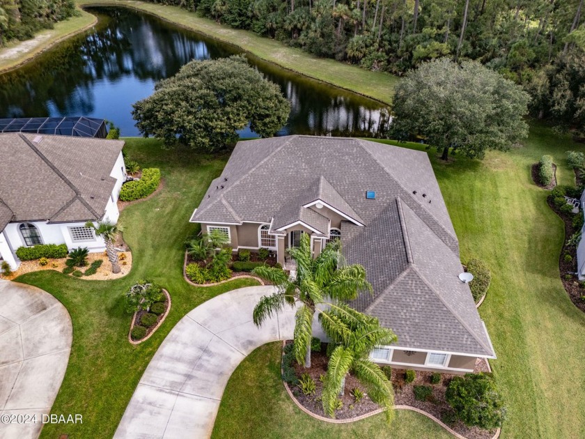 Enjoy Florida living with Palm trees & nature views. The quiet - Beach Home for sale in Ormond Beach, Florida on Beachhouse.com