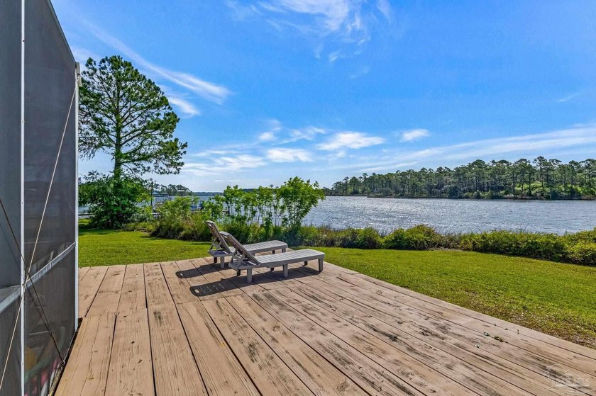 Tucked away on a quiet street and set on an impressive .60 acre - Beach Home for sale in Pensacola, Florida on Beachhouse.com