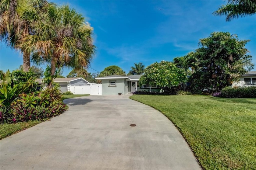 Beautiful 4 Bedroom, 2 Bathroom WATERFRONT TROPICAL OASIS only - Beach Home for sale in St. Petersburg, Florida on Beachhouse.com