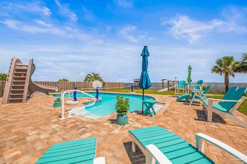 Waterfront Paradise with Pool, Dock, and Stunning Updates! 2 Bed - Beach Home for sale in Gulf Breeze, Florida on Beachhouse.com